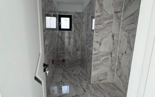 O locuință care pune accent pe confort, liniste si intimitate. - Poză 7