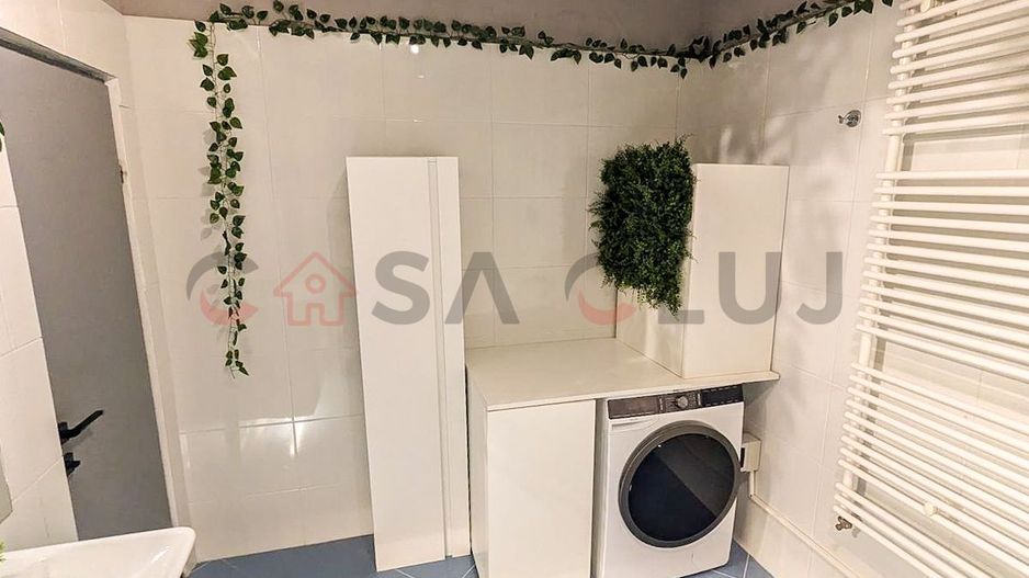 La cheie, cu doua locuri de parcare, ferit de agitatie si aglomeratie - Poză 11