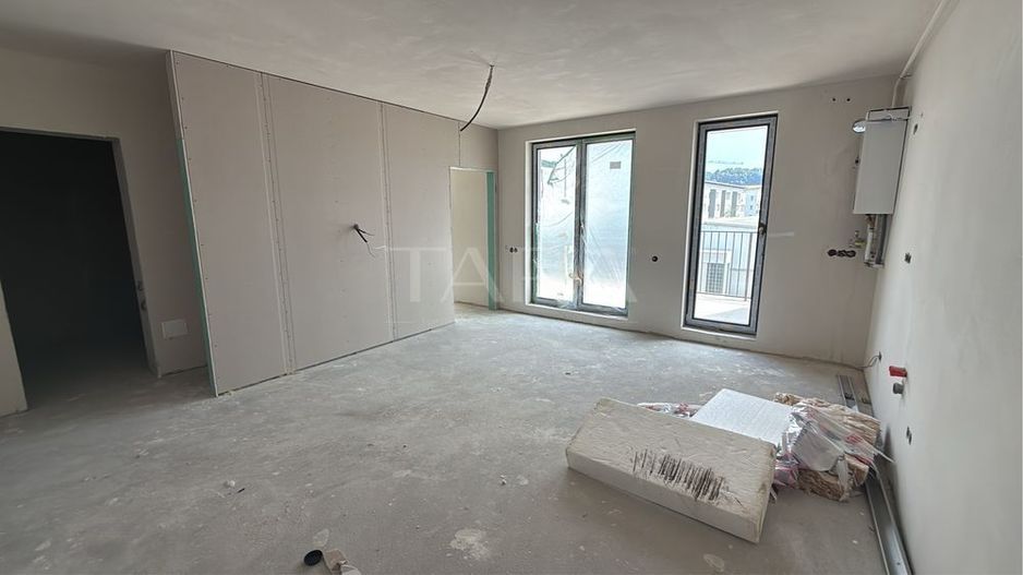 Apartament cu 2 camere, semifinisat, parcare subterană inclusă. - Poză 1