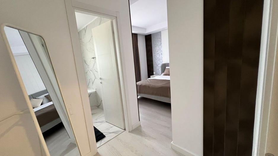 Apartament cu 3 camere de inchiriat in Cosmopolis - Poză 9