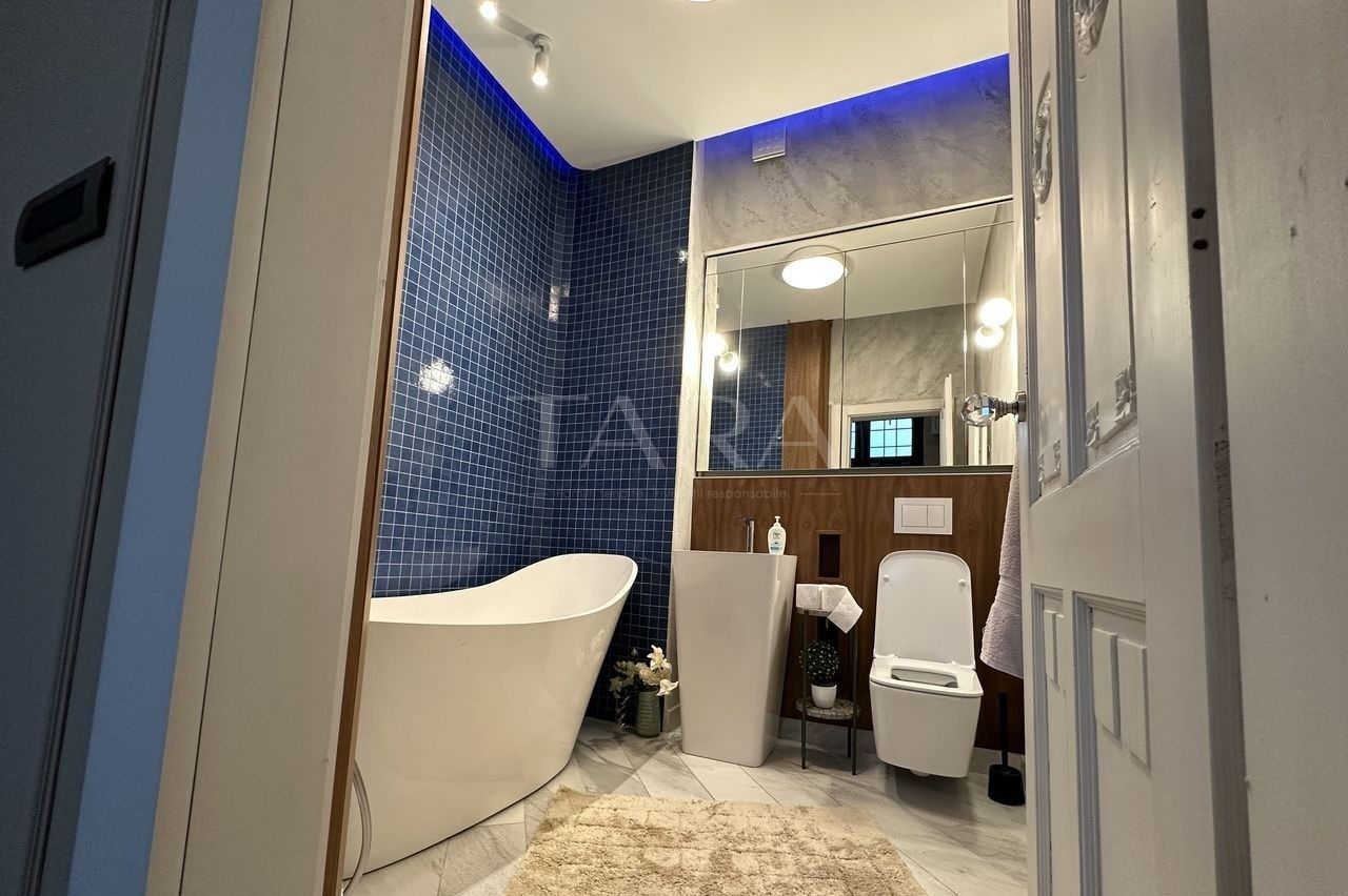 Eleganță, lumină și liniște – 3 camere în inima Clujului - Poză 14