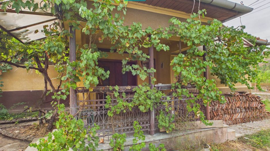 Casă cu 4 camere în localitatea Gurahonț, Arad - Poză 11