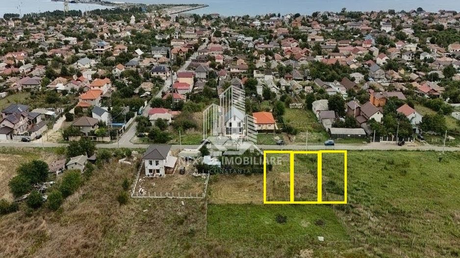 Oportunitate în 2 Mai, teren intravilan cu utilități și acces asfalt - Poză 1