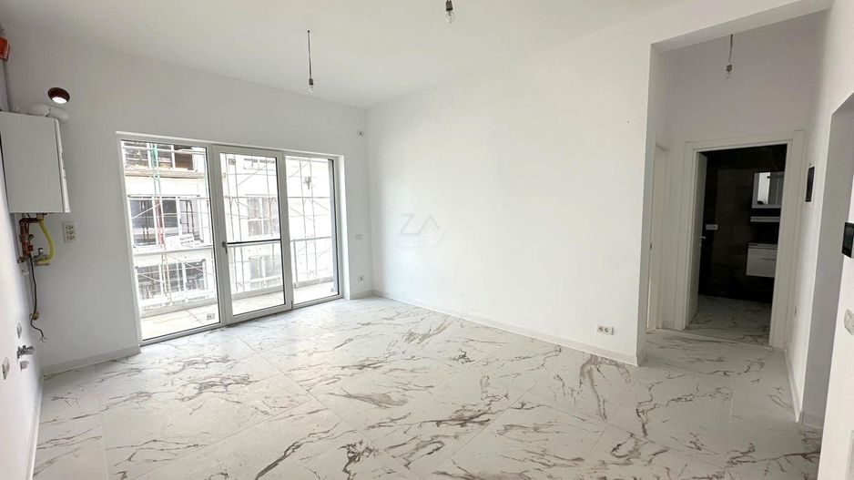 Etaj 1. Balcon mare. Loc de parcare. - Poză 1