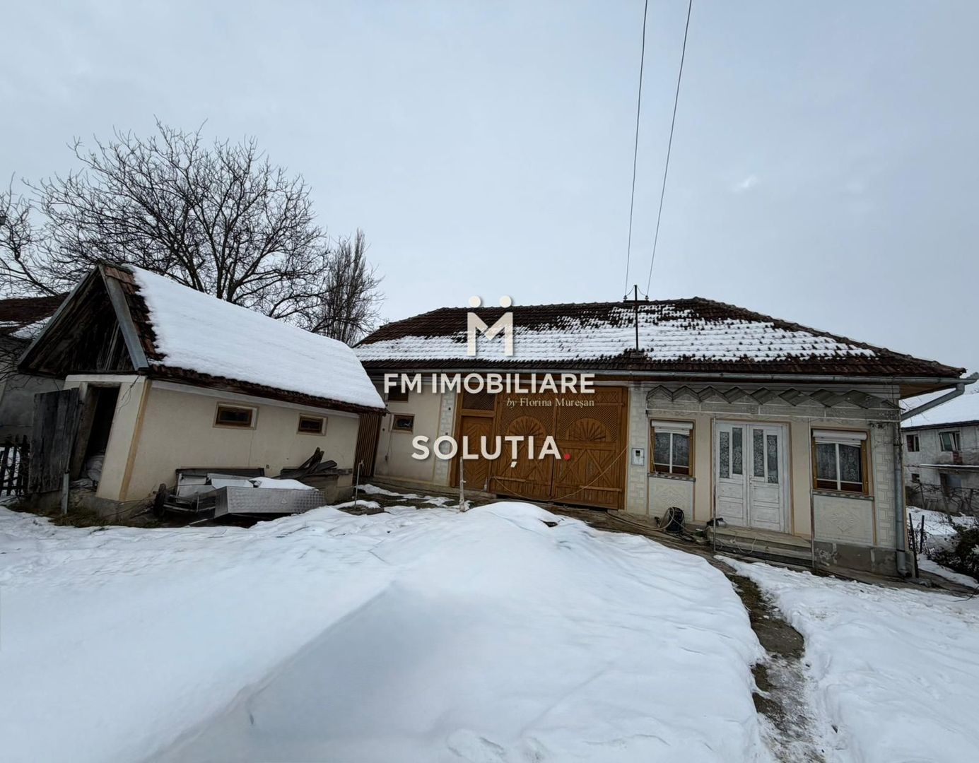 Casă cu teren generos în Buciumi - Poză 2