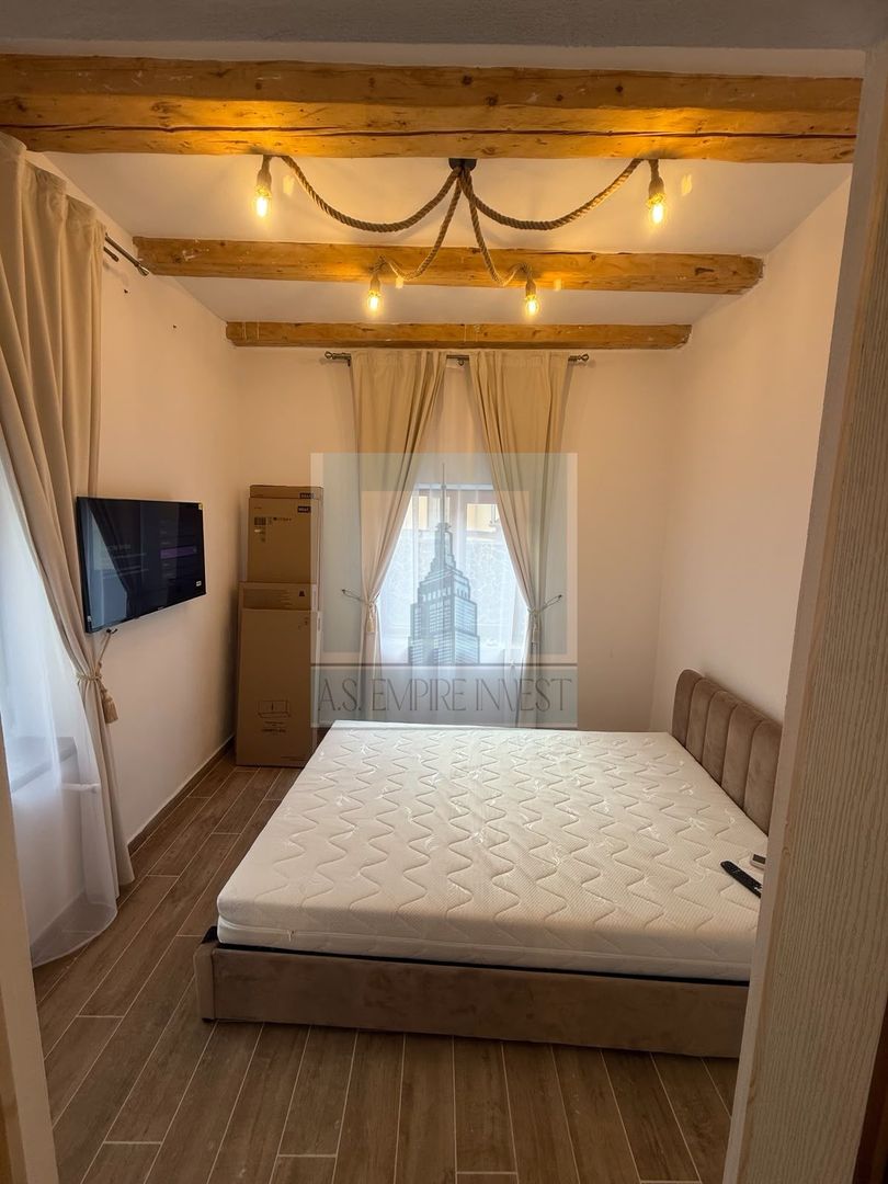 Garsonieră cochetă de închiriat în Schei - Poză 1