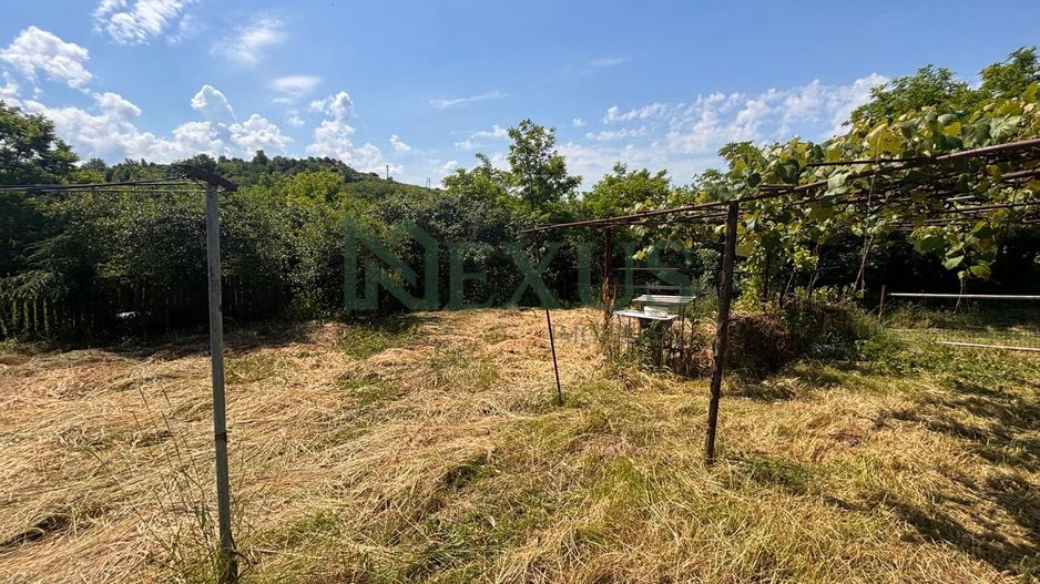 Casă bătrânească cu teren de 3.200 mp în Hertioana de Jos, jud.Bacău - Poză 18