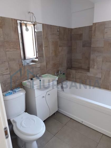 închiriez apartament cu o camera - Poză 8