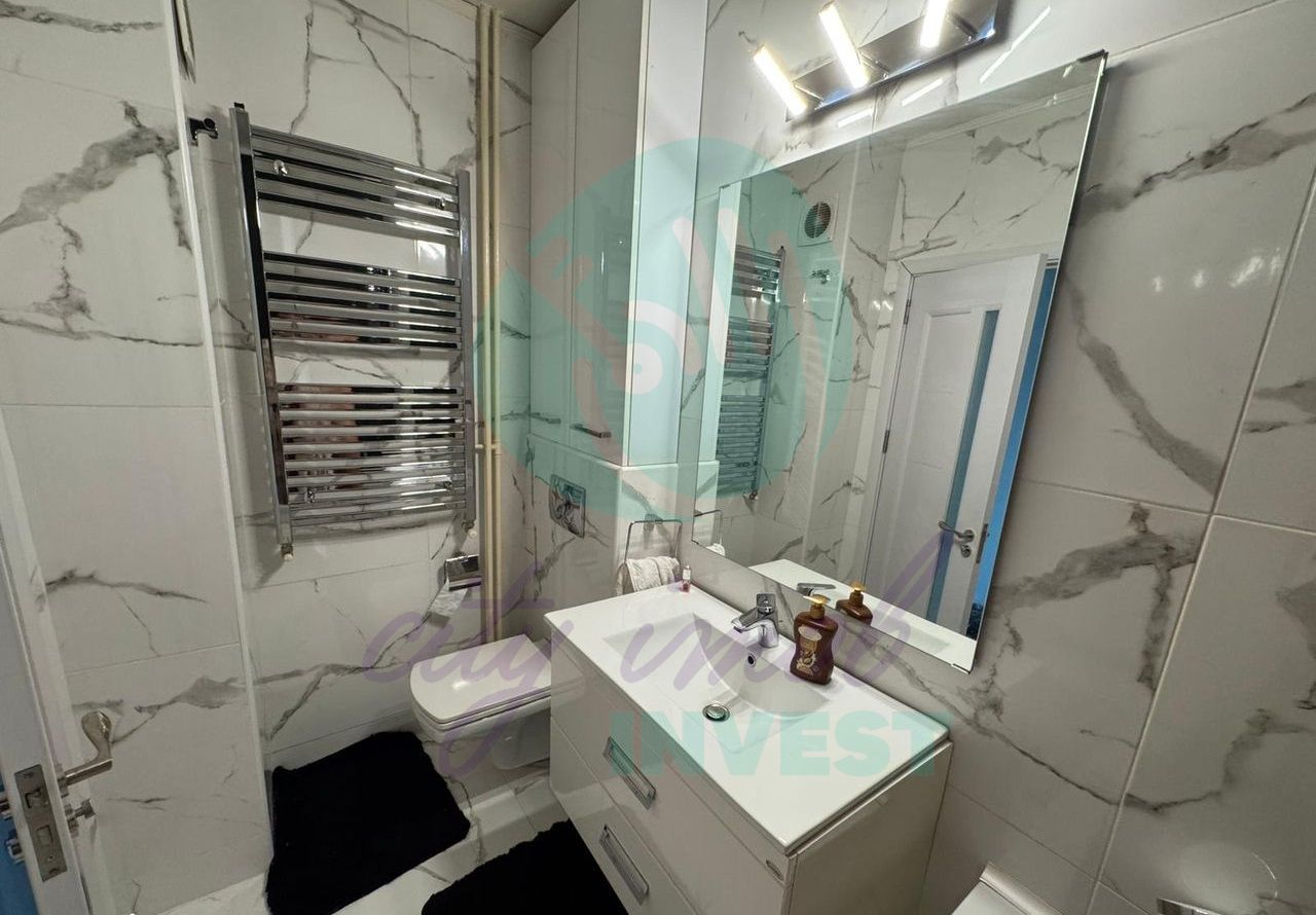 Garsoniera cu CENTRALA PROPRIE - Poză 14