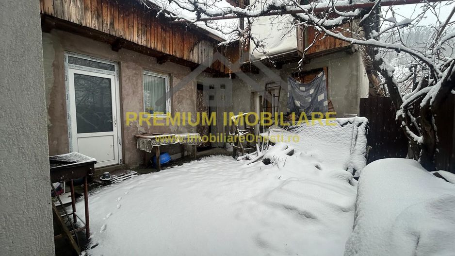 Casă batraneasca+ teren 999 mp intravilan în Oituz - Poză 19