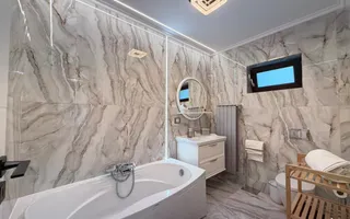Casa P+1+M cu teren de 650 mp, piscina si curte complet amenajata - Poză 26