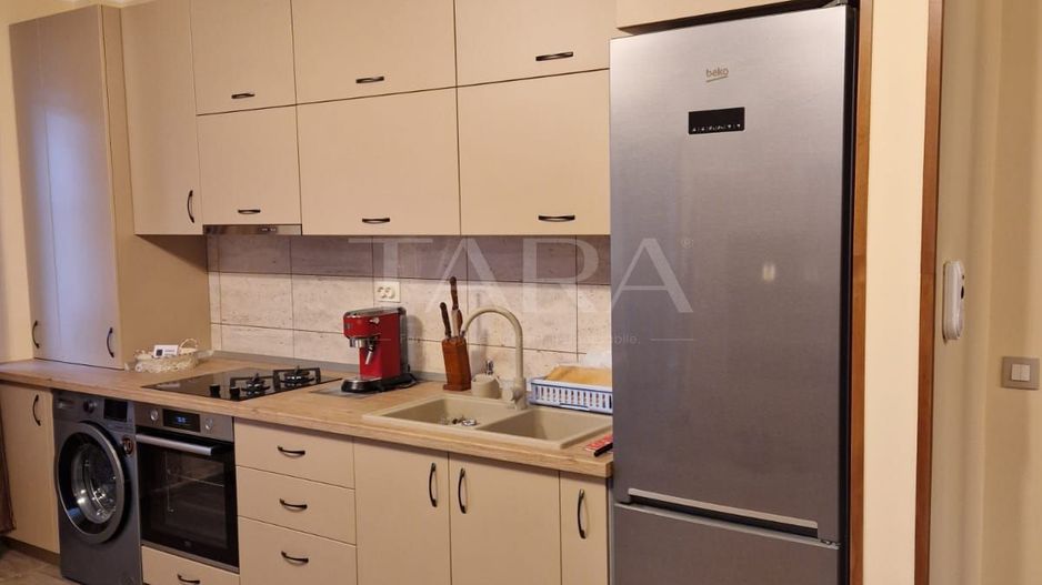 Locuință modernă, cu terasă de 40 mp și parcare. - Poză 1