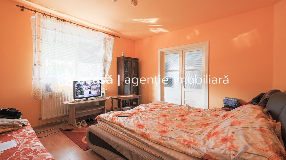 O casă în Grădiște, cu grădină proprie - teren 316 mp - Poză 5