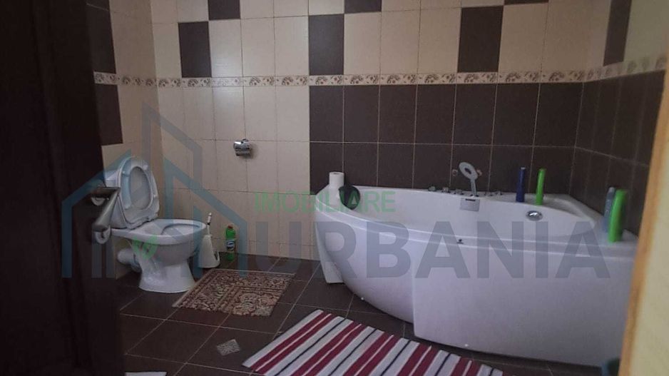 Casă cu 2 niveluri, compusă din 2 apartamente distincte, Tomesti - Poză 5