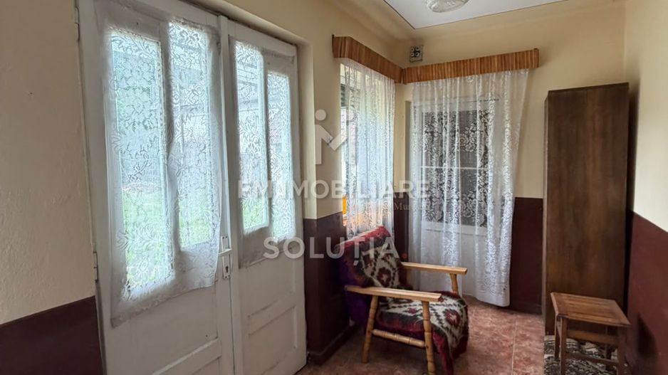 Casă cu teren generos în Buciumi - Poză 10