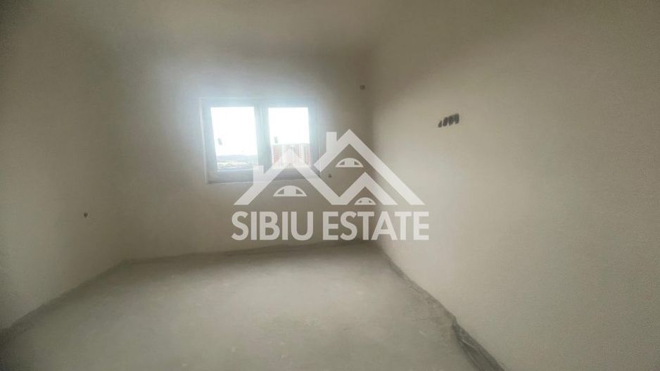 Apartament decomandat cu 3 camere, 2 bai -s.utila 61.57 mp - loc de parcare - Poză 10