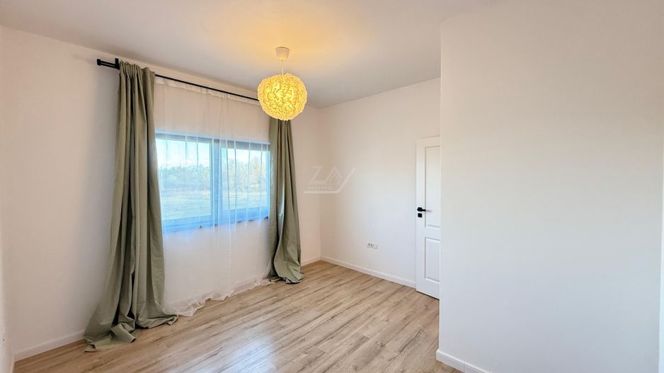 PRIMA INCHIRIERE. Casa moderna si cocheta. Curte amenajata. Loc de parcare. - Poză 22