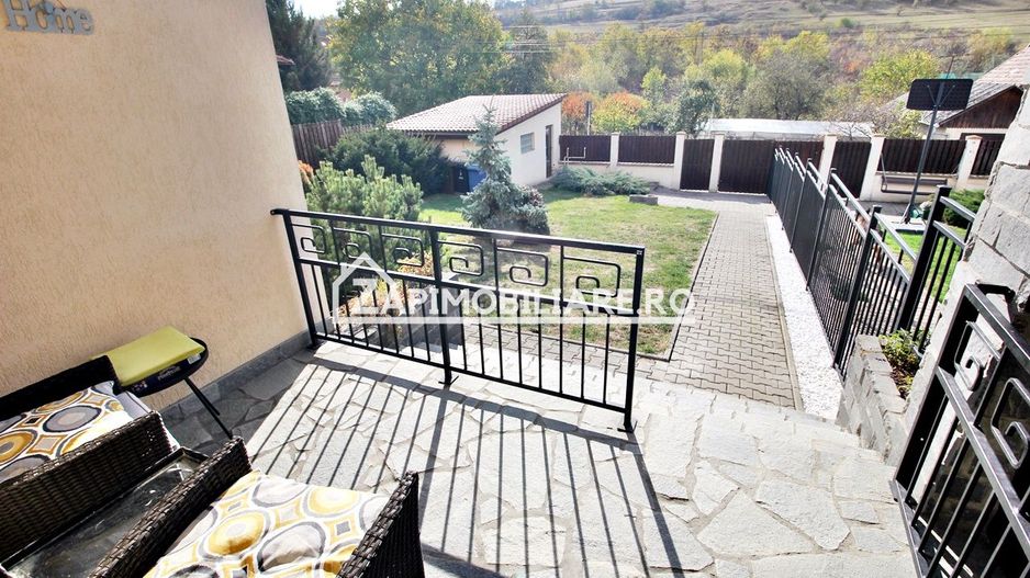 Casa 3 camere, 2 bai,1 garaj,teren 360 mp.zona Dambu Pietros - Poză 13
