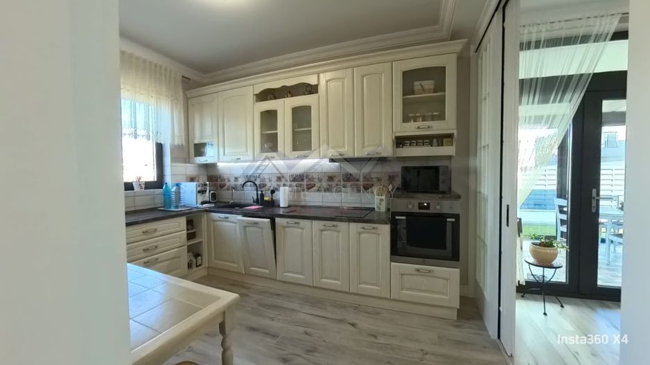 Casă complet mobilată și utilată, cu grădină amenajată | teren 500 mp - Poză 9