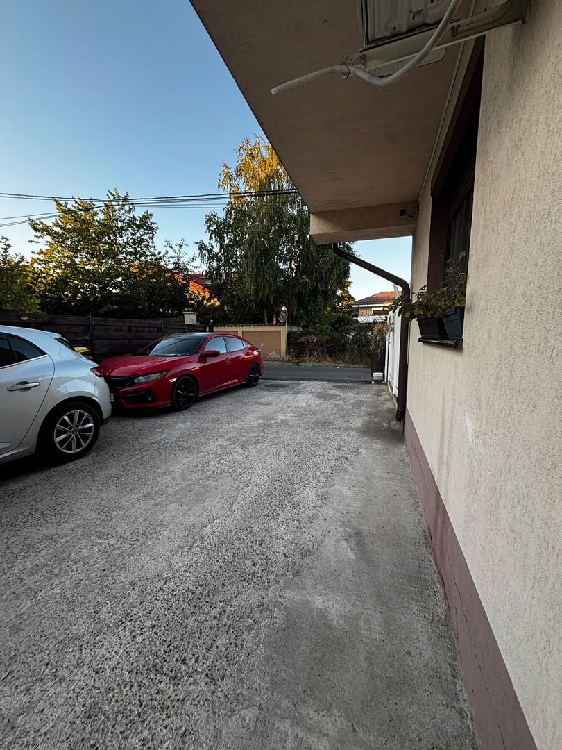 Apartament Modern și Spațios cu Grădină Privată și 2 Locuri de Parcare Incluse! - Poză 5