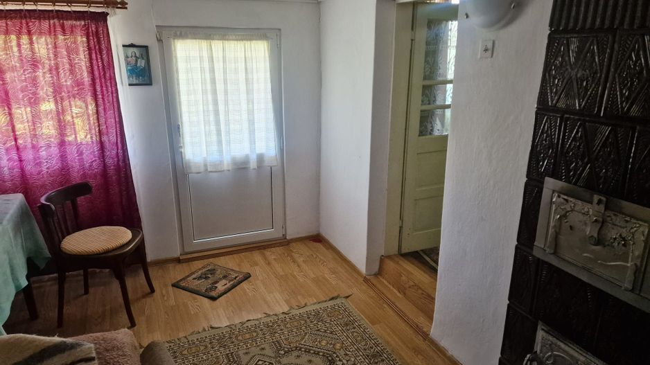 Casa in mediu rural cu teren - Poză 10