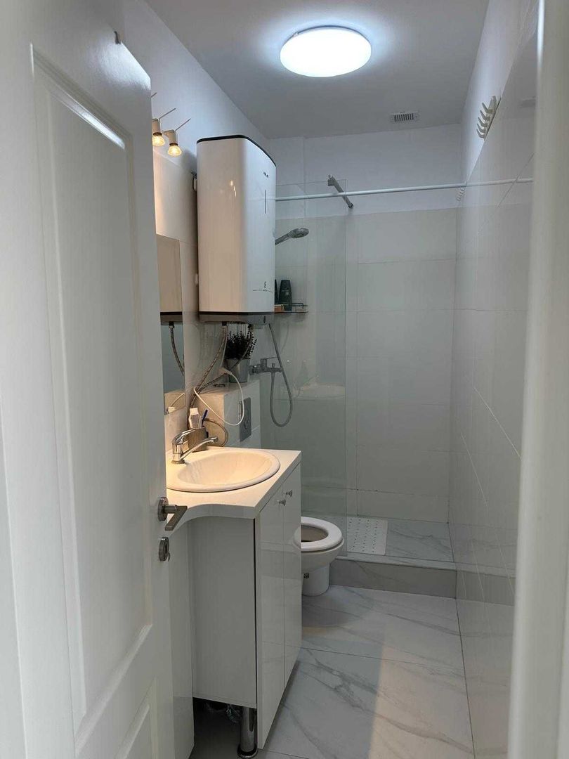 Apartament 2 camere de vânzare - Piața Romană - mobilat nou, vedere pe spate - Poză 7