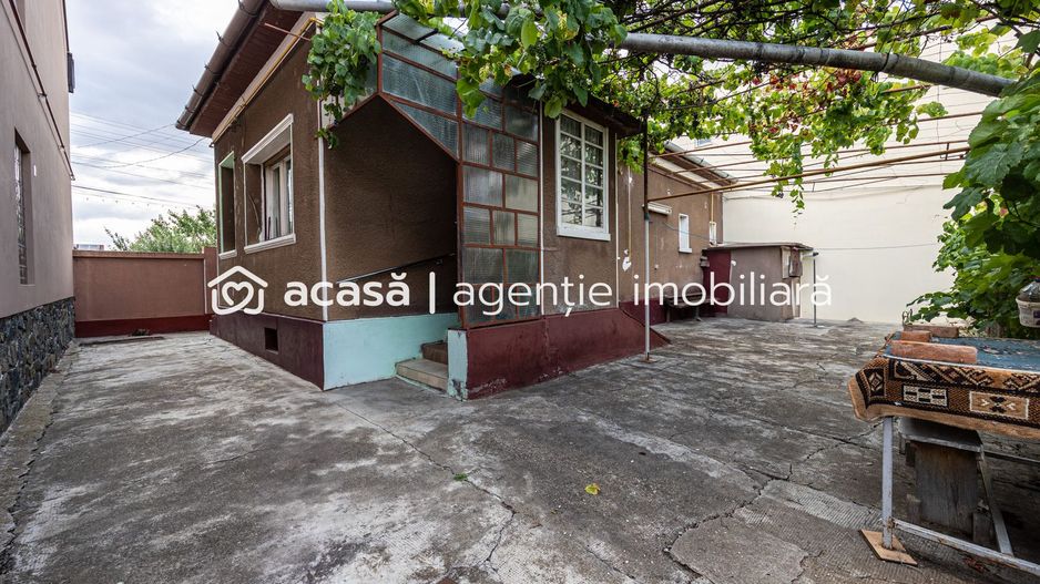 O casă în Grădiște, cu grădină proprie - teren 316 mp - Poză 4