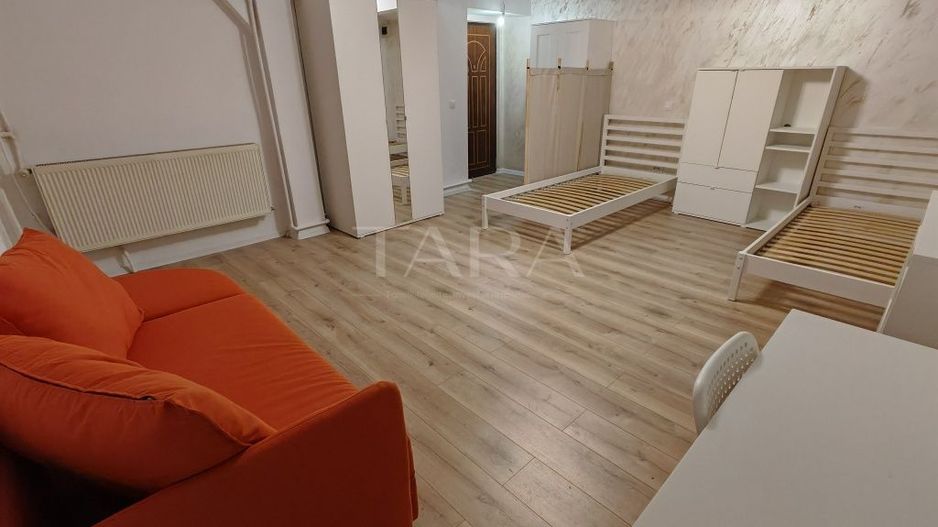 Garsonieră ultracentrală renovată – ideală pentru investiție - Poză 6