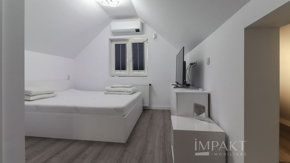 Casa insiruita cu finisaje de lux in cartierul Europa - Poză 18