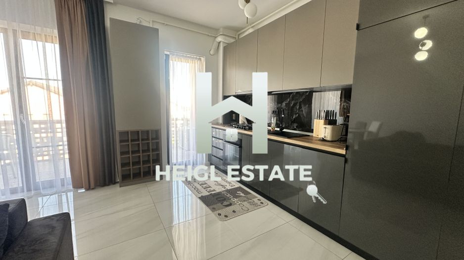 Heigl Estate vă propune spre închiriere un apartament cu 2 camere si piscina - Poză 1