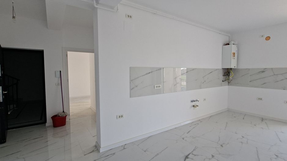 Apartament cu 3 camere si un loc de parcare - Poză 5