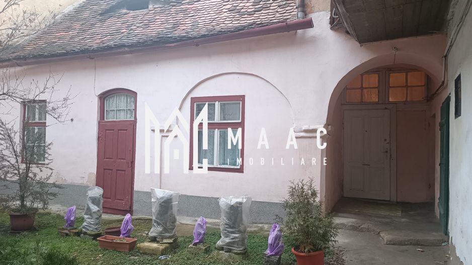 Casa | 40 MPU | Curte comuna | Zona Centrala - Poză 2