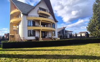 Apartament la casă cu grădină - Poză 2