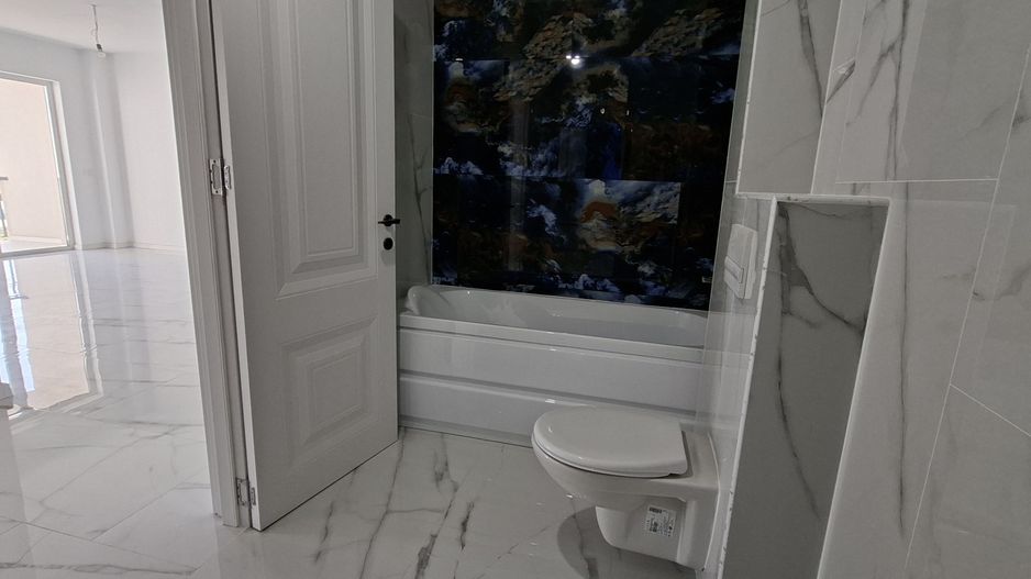 Apartament cu 3 camere si un loc de parcare - Poză 8