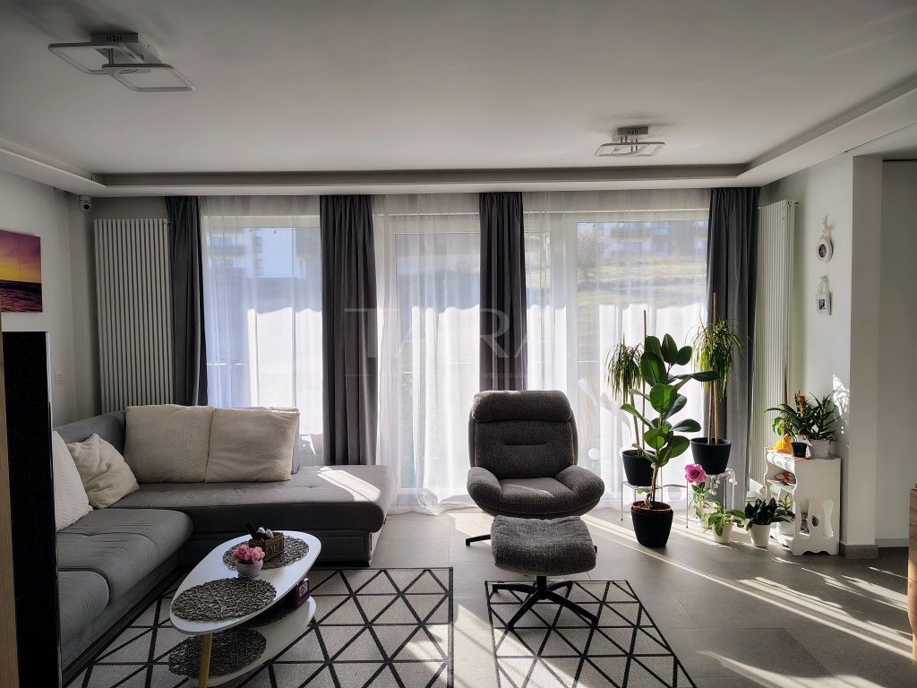 Apartament spațios și modern,  zonă liniștită și verde. - Poză 1