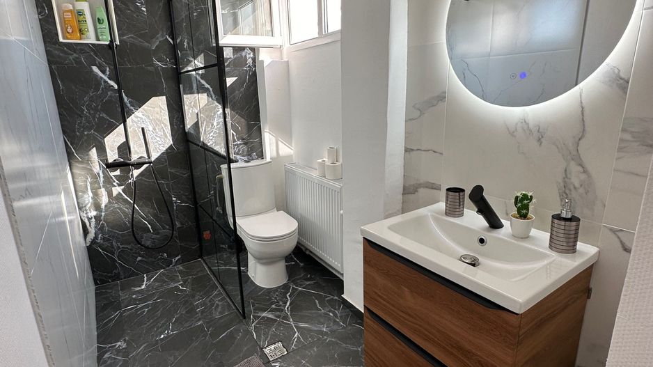 Ofer spre închiriere apartament 2 camere zona Piața Romana - Poză 8