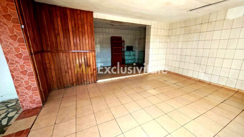 Casă cu teren generos în Dârmănești, Argeș-ideală pentru locuința sau afacere - Poză 9