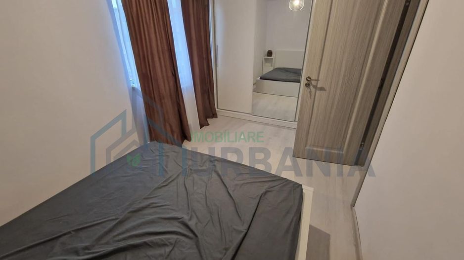 Apartament 2 camere de închiriat în Alexandru cel Bun, renovat integral și mobilat modern - Poză 18