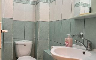 Apartament cu 2 camere, 2 bai, decomandat, etaj 1 - zona Racadau - Poză 9
