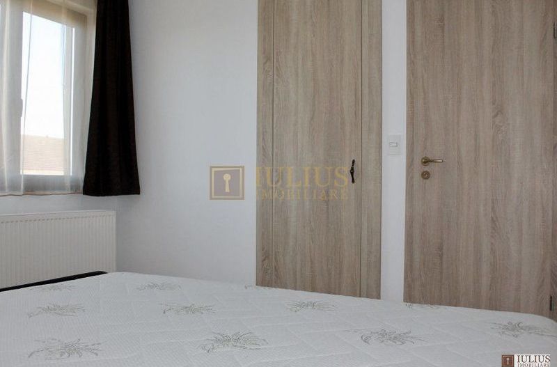 2 dormitoare, 80 mp utili, gradina si curte proprie de 300mp. - Poză 12