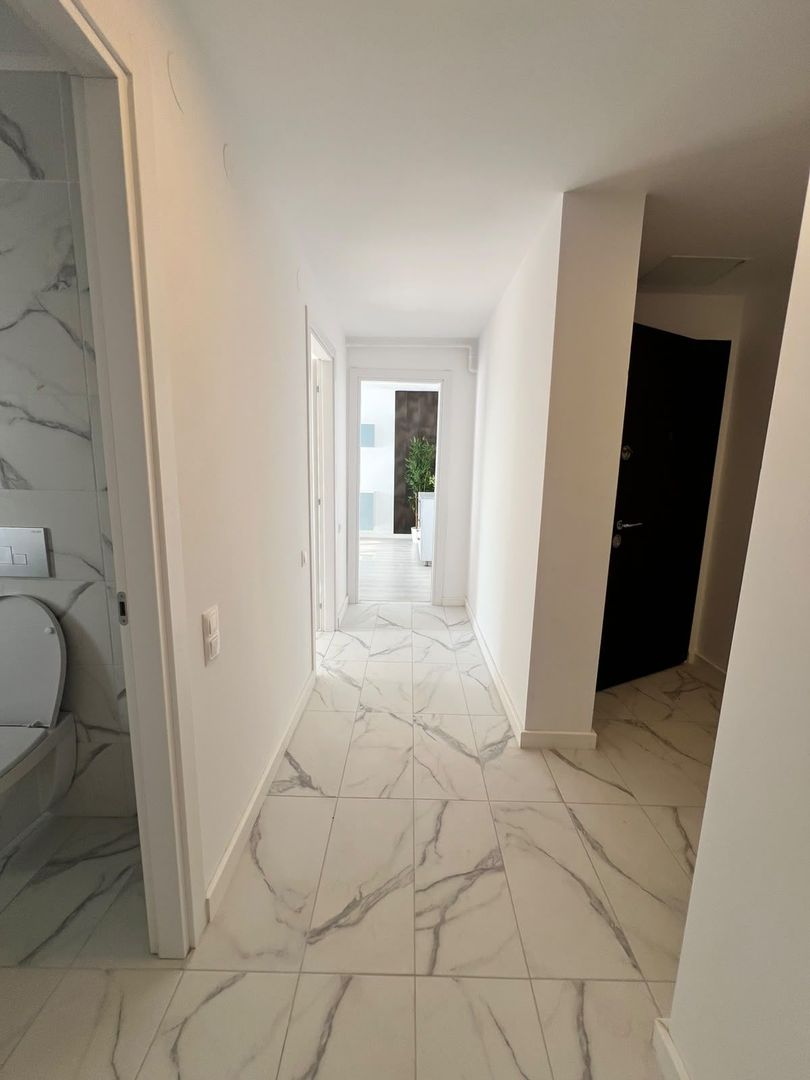 Apartament cu 3 camere de inchiriat in Cosmopolis - Poză 10