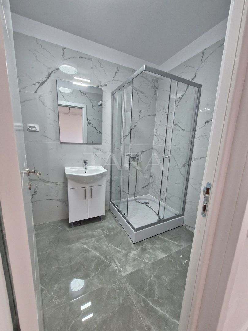 Apartament cu 2 camere, balcon 10 mp, parcare subterană inclusă. - Poză 5