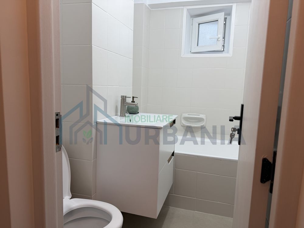 Apartament cu 2 camere în centrul orașului Pașcani, etaj 2, 67 mp, bloc cu lift - Poză 4