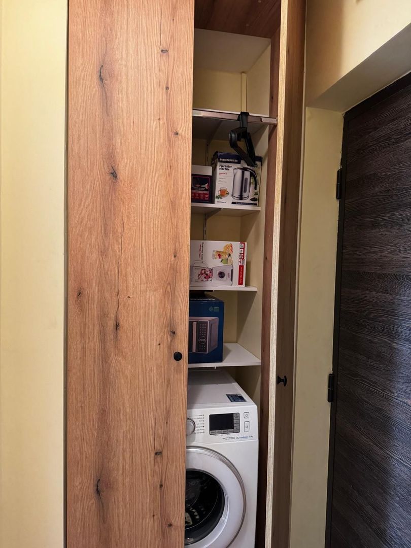 Garsoniera Centrul Civic bloc de apartamente - Poză 13
