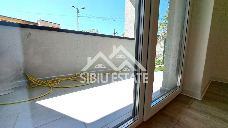 Apartament 61 mp modern finisat la cheie, gradina si terasa Selimbar - Poză 10