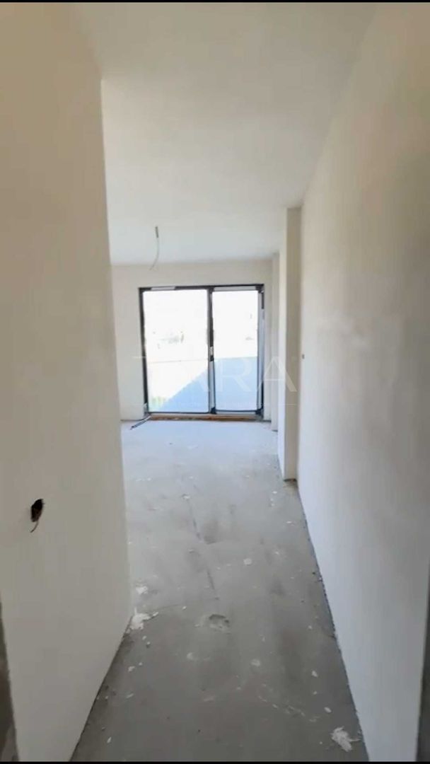 Apartament cu 2 camere, 55 mp, balcon generos și garaj subteran. - Poză 2