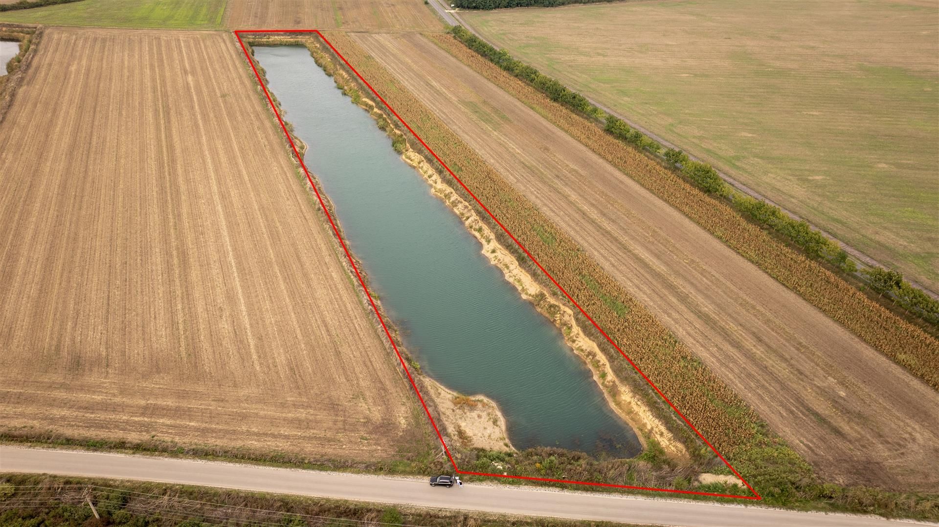 Teren extravilan Santau cu luciu de apa - Poză 1