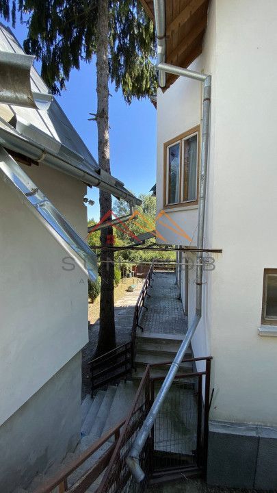 Vila de vanzare, teren 3100 mp, 7 camere, 6 grupuri sanitare, 3 CT, an 1997 - Poză 60