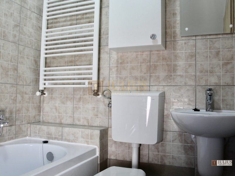 2 dormitoare, 80 mp utili, gradina si curte proprie de 300mp. - Poză 13