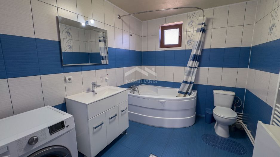 Casă modernă cu 5 camere, garaj și curte mare, mobilată in Corbu - Poză 7